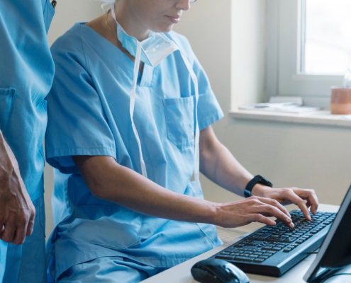 Doctor using computer at the hospital. Medical concept