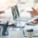 diverse coworkers working together in boardroom